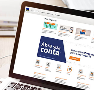 Produto para o seu negócio Notebook ligado na tela do Itaú Empresas